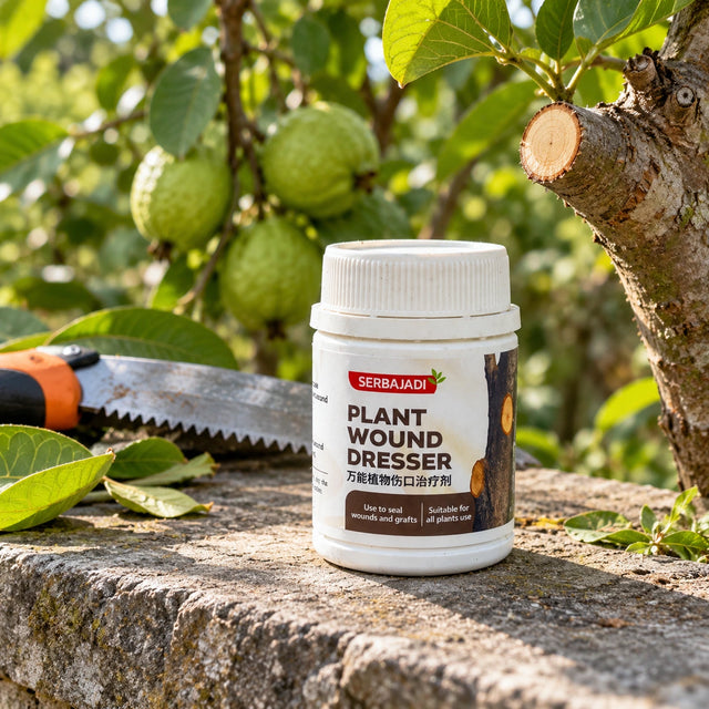 Serbajadi Plant Wound Dresser beside a potted fruit tree and pruning shears.